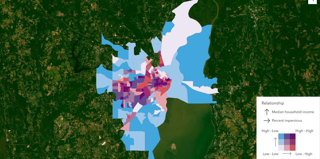 Map of Mobile, Alabama highlighting areas most vulnerable to coastal flood risk, focusing on regions with high impervious surface levels and lower median household income